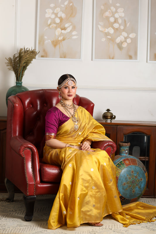 Yellow pure chanderi silk handwoven saree with thin zari border and meenakari buttis, front angle 1